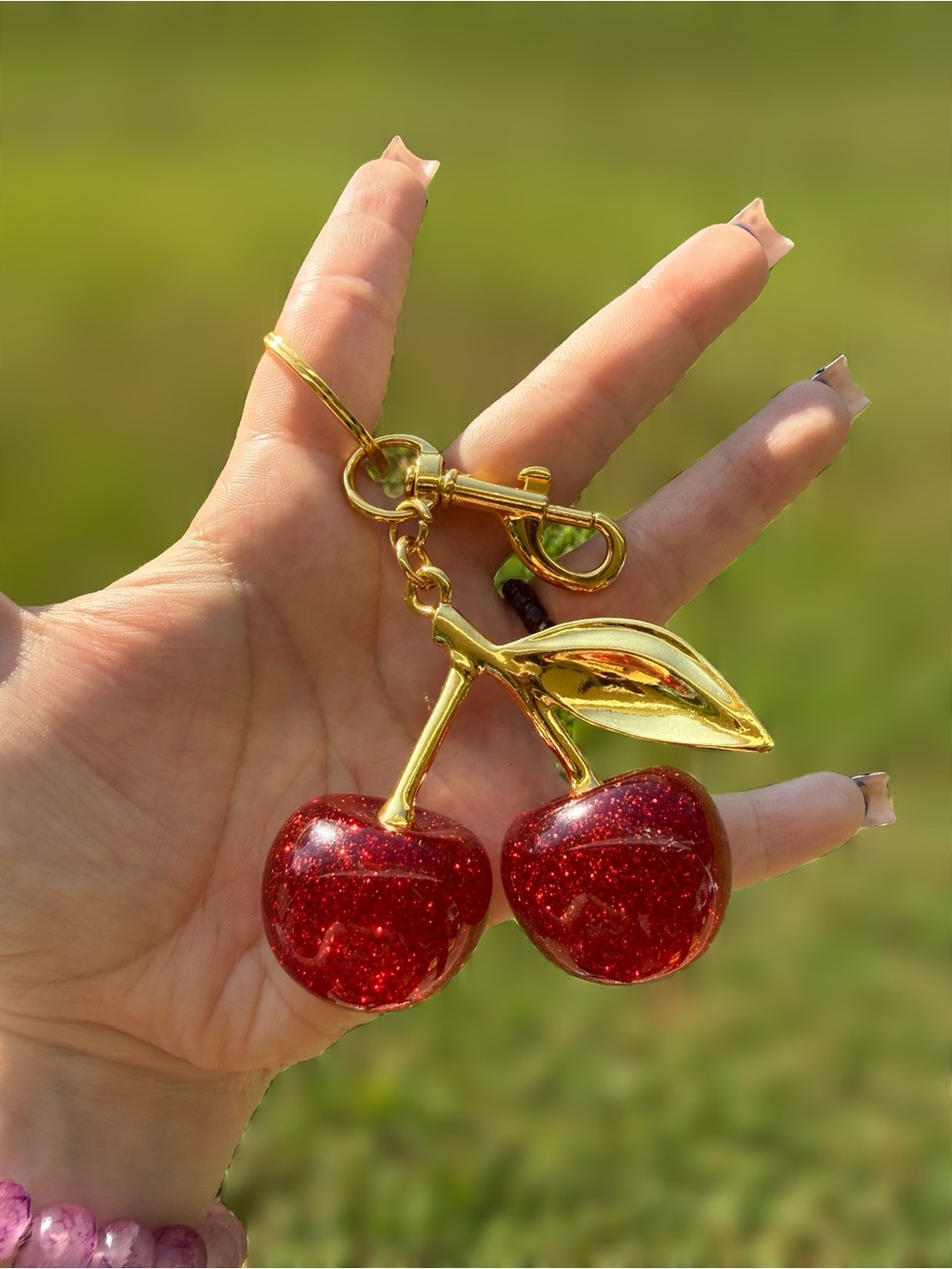 Gold-Tone Cherry Keychain with Red Glitter Cherries
